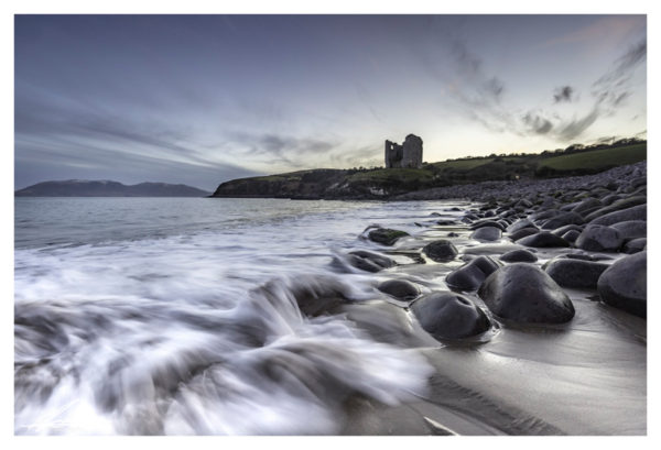 Minard castle and waves